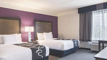 Premium bedding, desk, laptop workspace, iron/ironing board