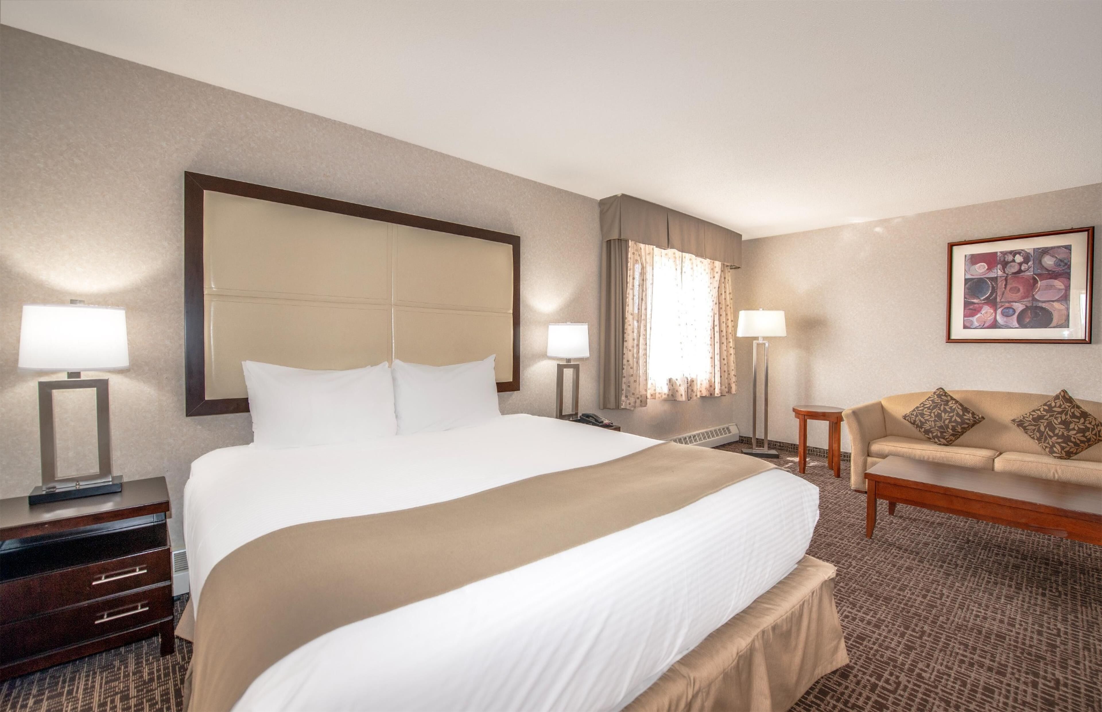 Premium bedding, Select Comfort beds, desk, iron/ironing board