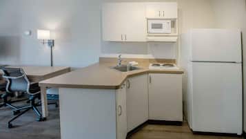 Full-sized fridge, microwave, stovetop, coffee/tea maker