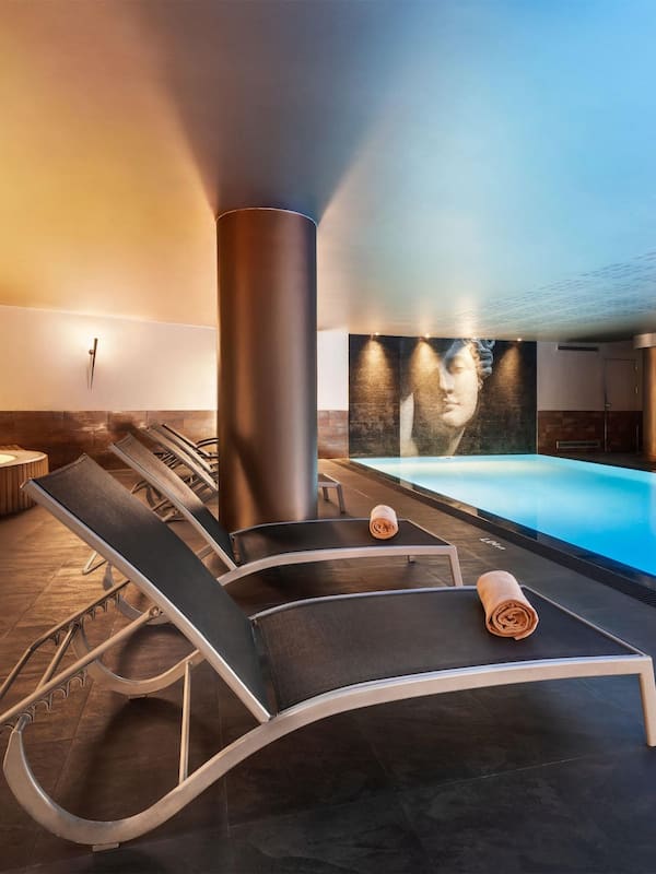 Indoor pool, open 9:00 AM to 8:00 PM, sun loungers