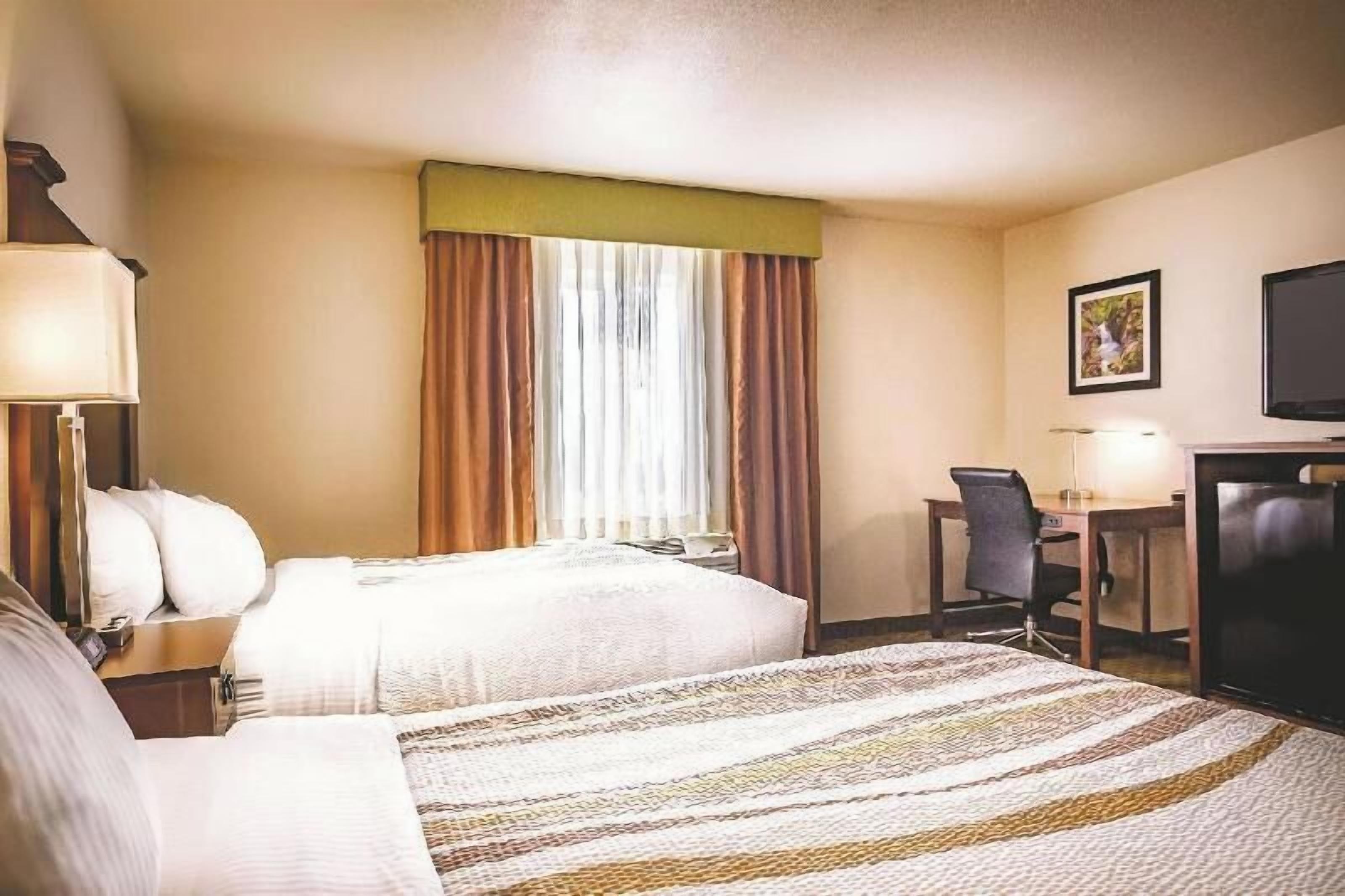 Premium bedding, down comforters, pillowtop beds, desk