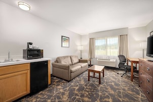 Suite, 1 King Bed, Non Smoking | Premium bedding, down comforters, pillowtop beds, desk