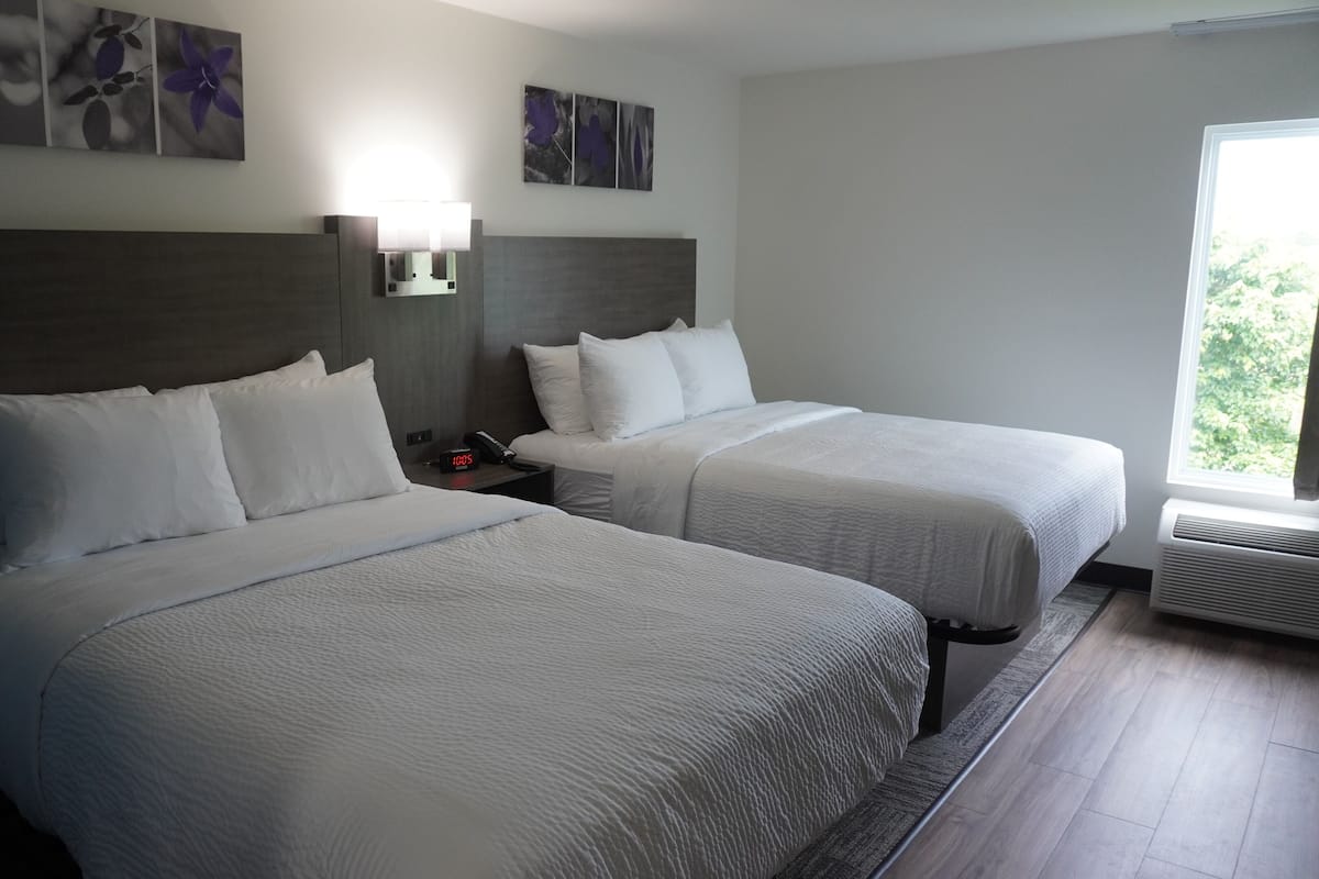 Standard Room, 2 Queen Beds, Non Smoking | Iron/ironing board, rollaway beds, free WiFi, bed sheets