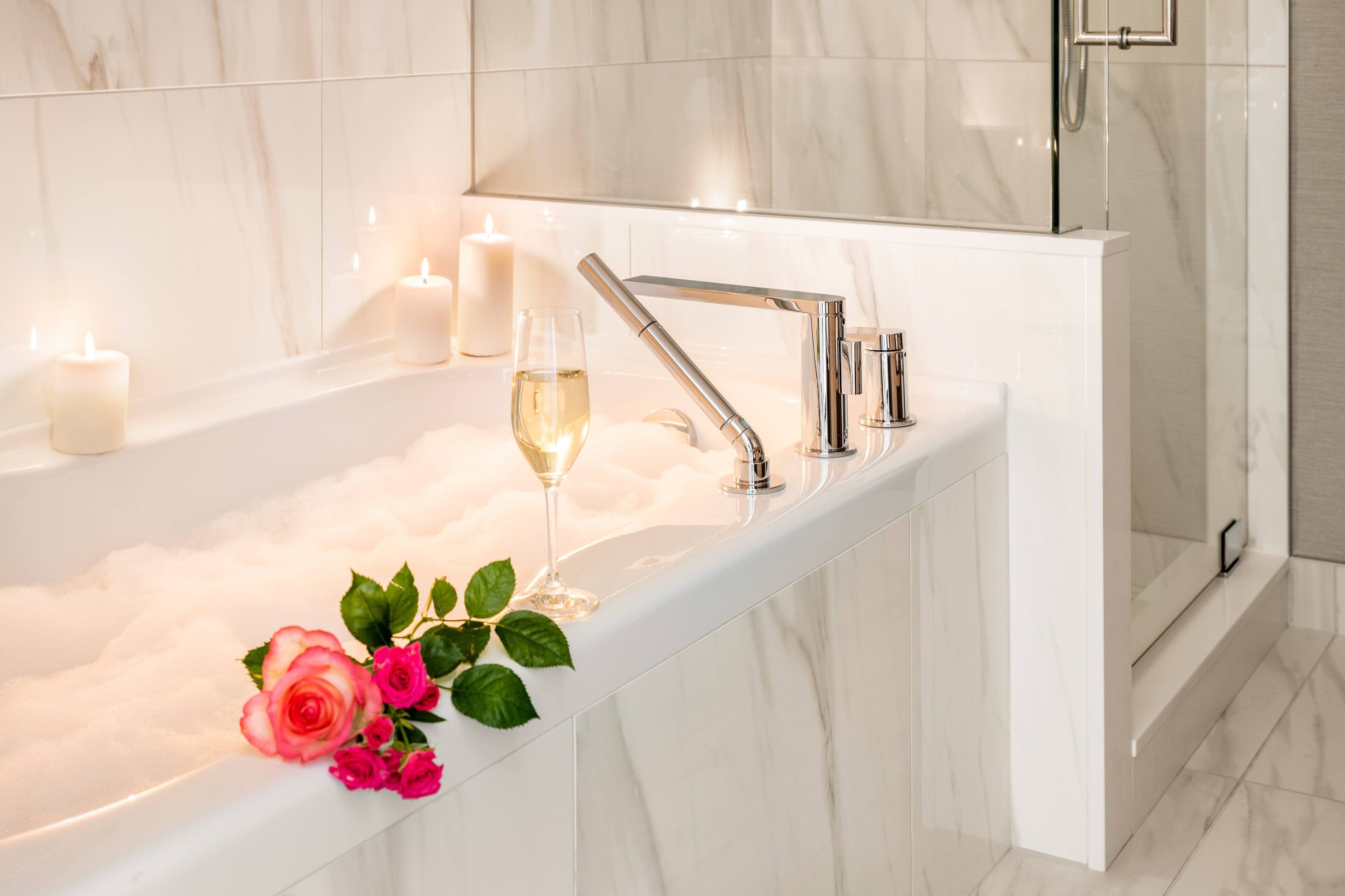 designer toiletries, hair dryer, bathrobes, slippers