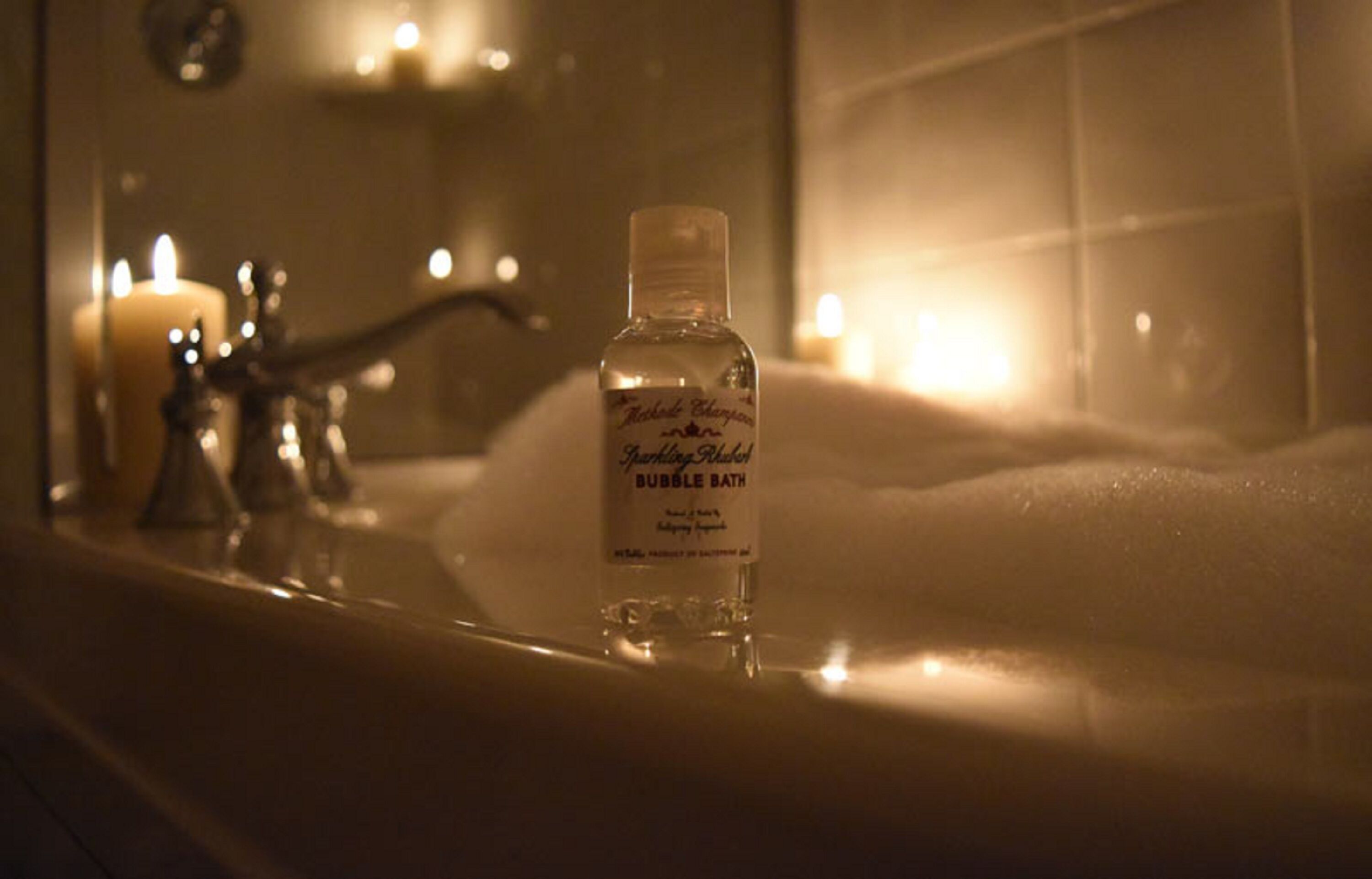 deluxe corner room | bathroom | designer toiletries, hair dryer, bathrobes, slippers