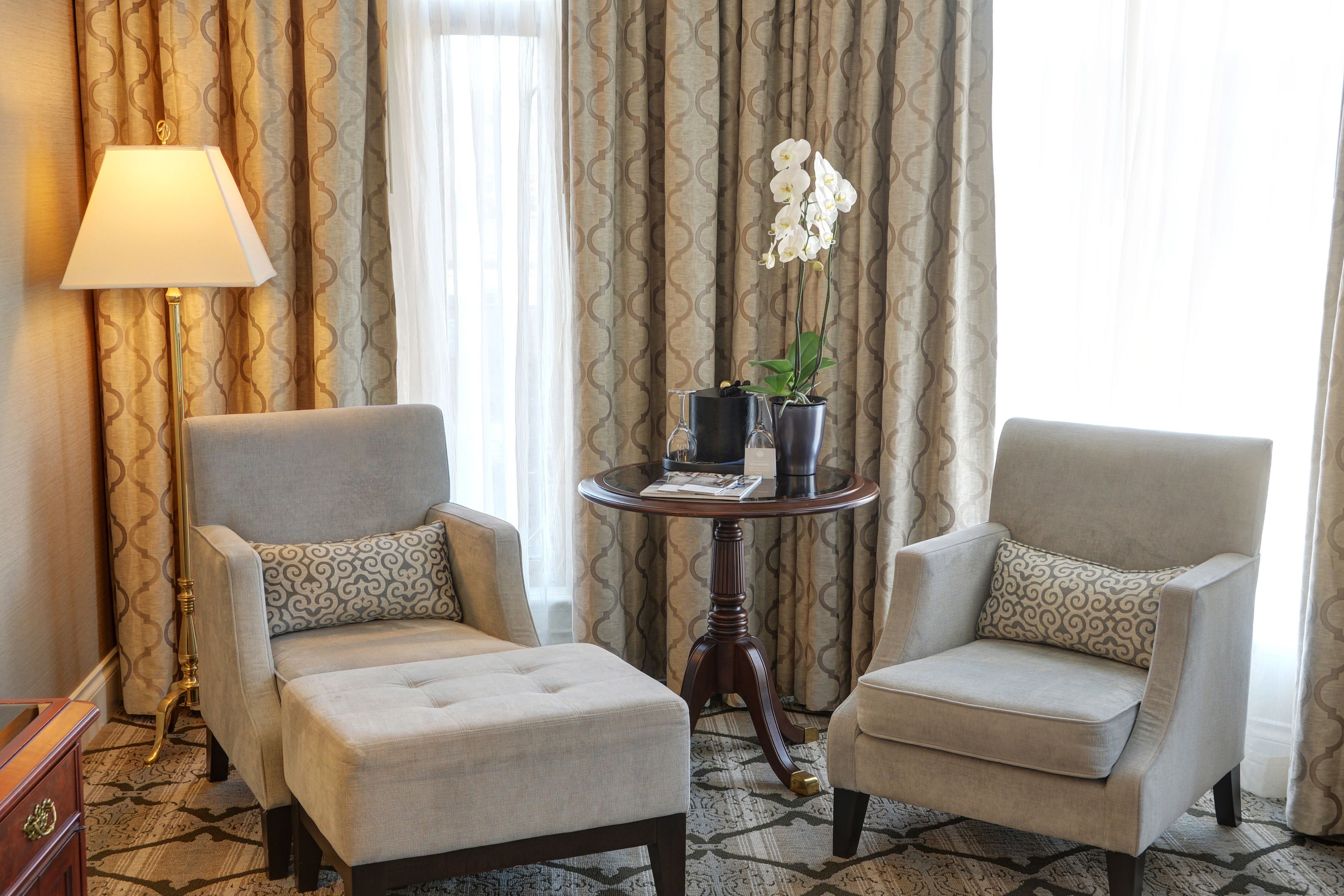 deluxe corner room | living area | 50-inch lcd tv with cable channels, tv, ipod dock