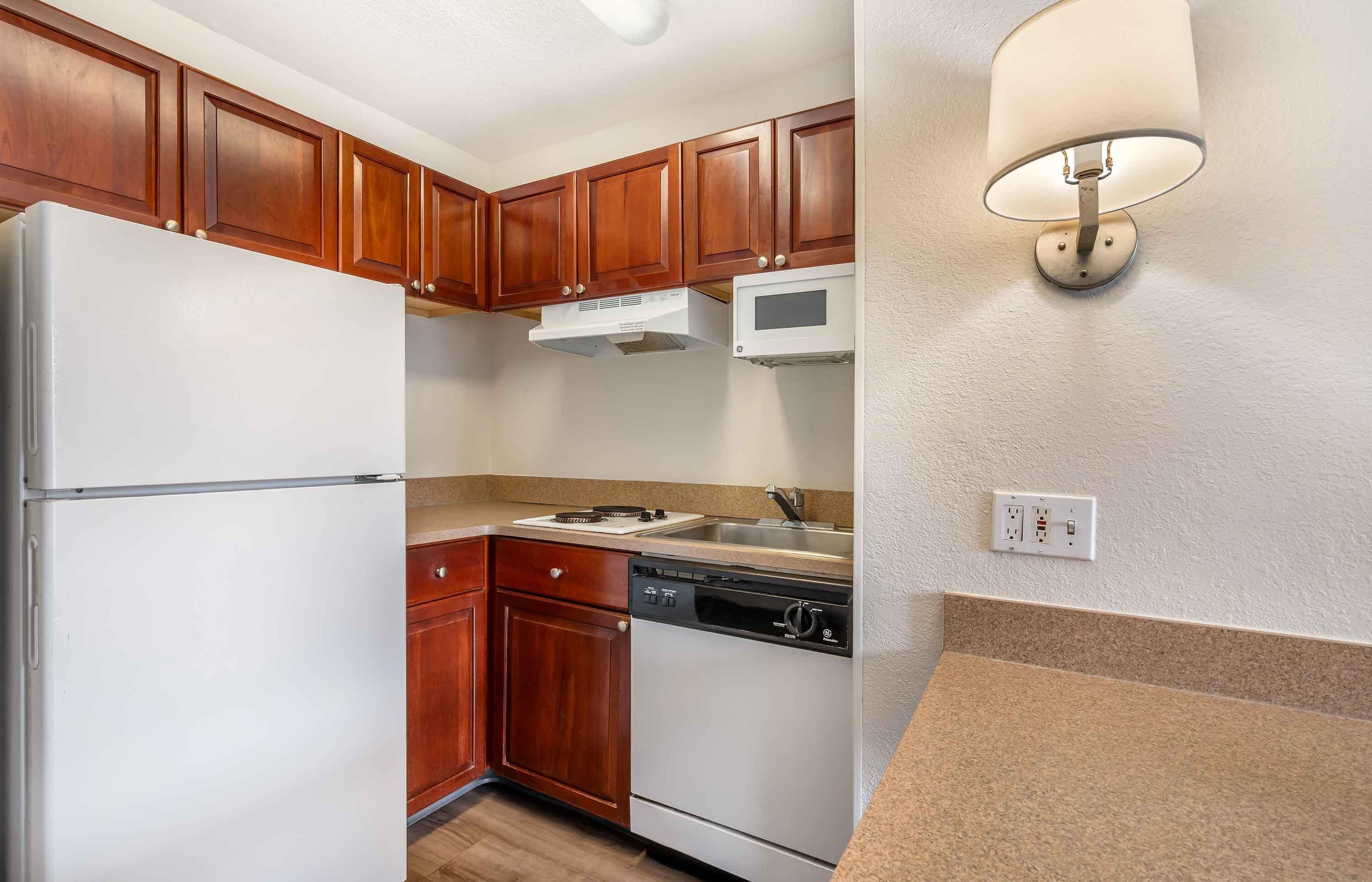 Suite, 2 Double Beds, Non Smoking | Private kitchen | Fridge, microwave, stovetop, coffee/tea maker