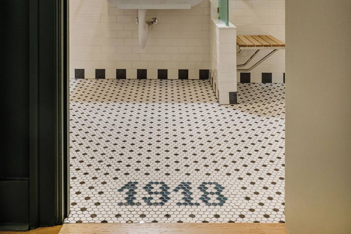 combined shower/bathtub, designer toiletries, hair dryer, bathrobes