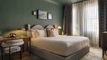 Suite, 1 King Bed, Corner | Pillowtop beds, in-room safe, blackout drapes, iron/ironing board