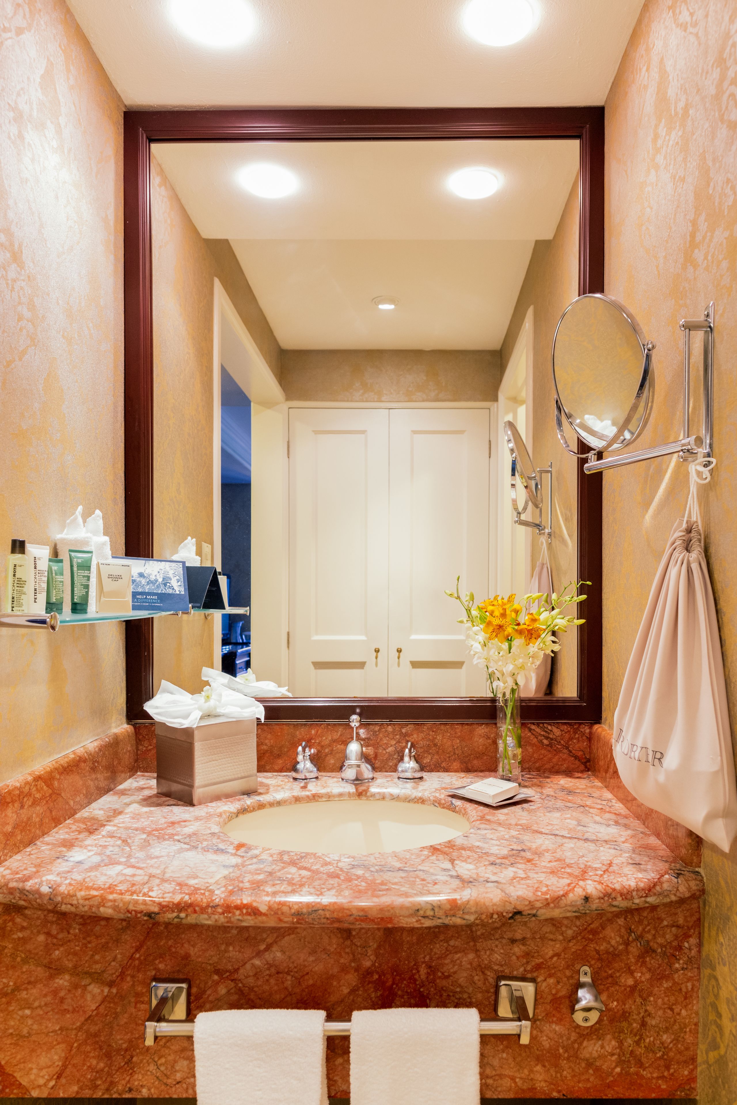 combined shower/bathtub, designer toiletries, hair dryer, towels