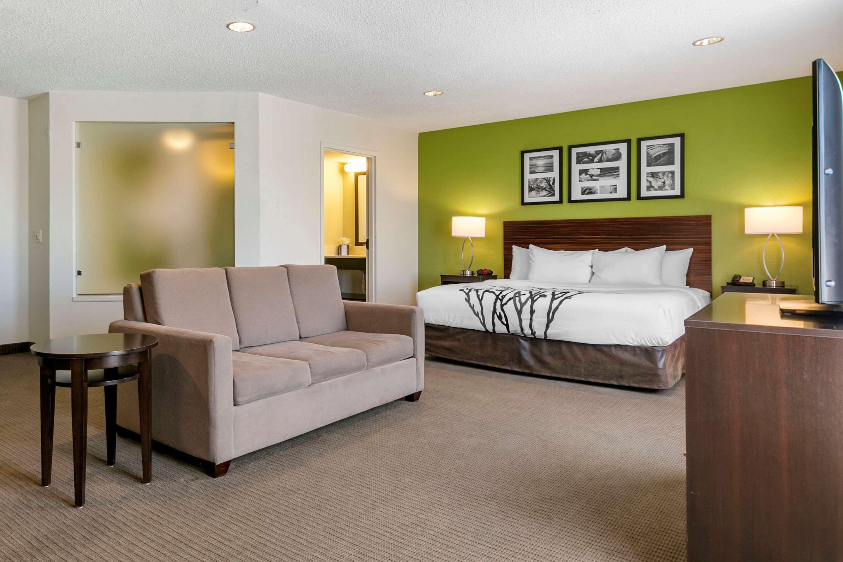 desk, laptop workspace, iron/ironing board, rollaway beds