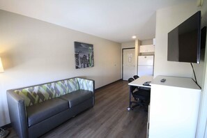 Desk, laptop workspace, blackout curtains, iron/ironing board
