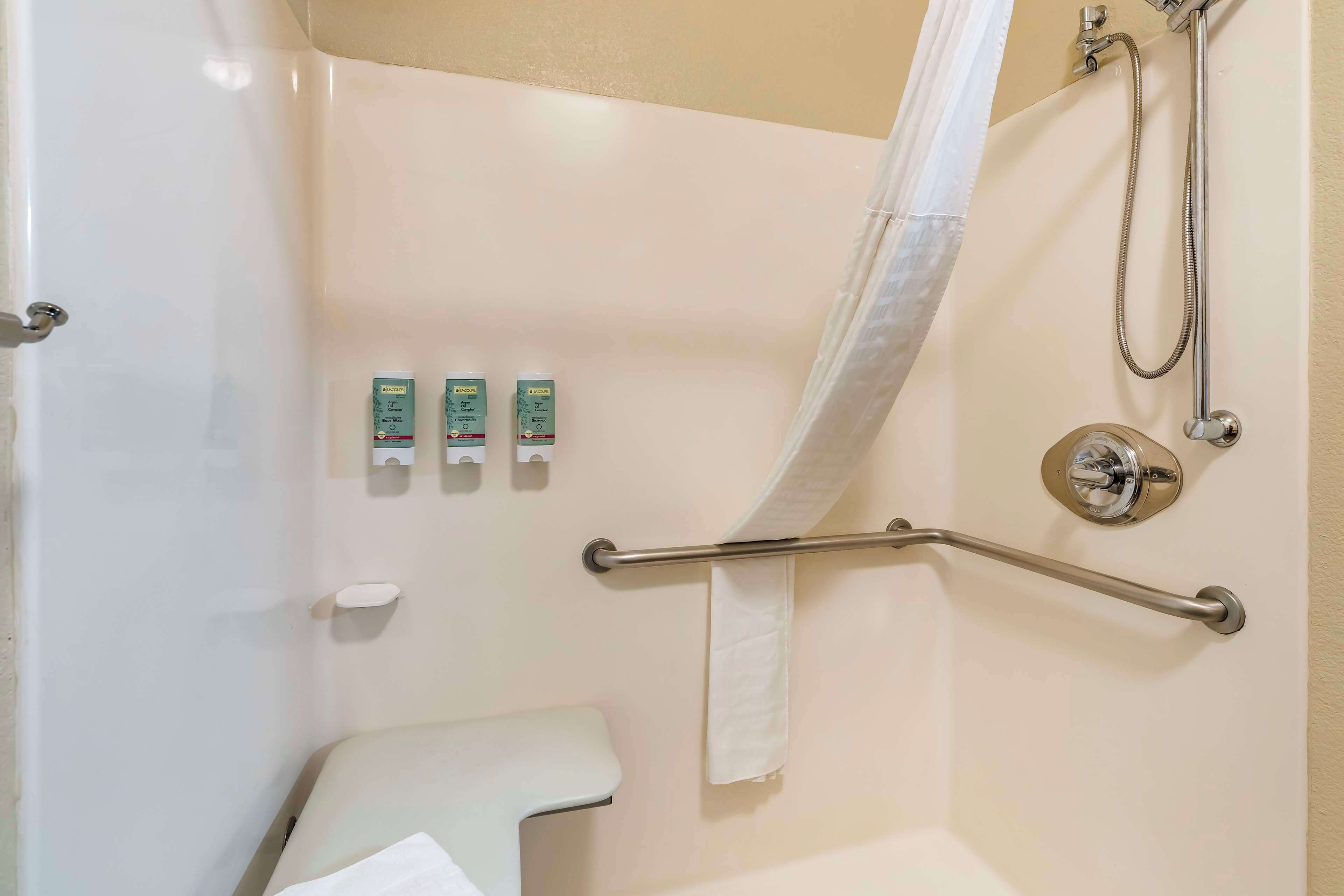 standard room, 2 queen beds, accessible, non smoking | bathroom | combined shower/bathtub, free toiletries, hair dryer, towels