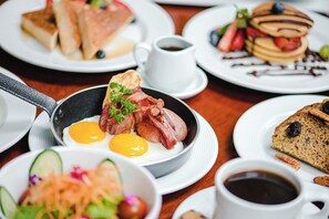 Daily buffet breakfast (USD 12 per person)