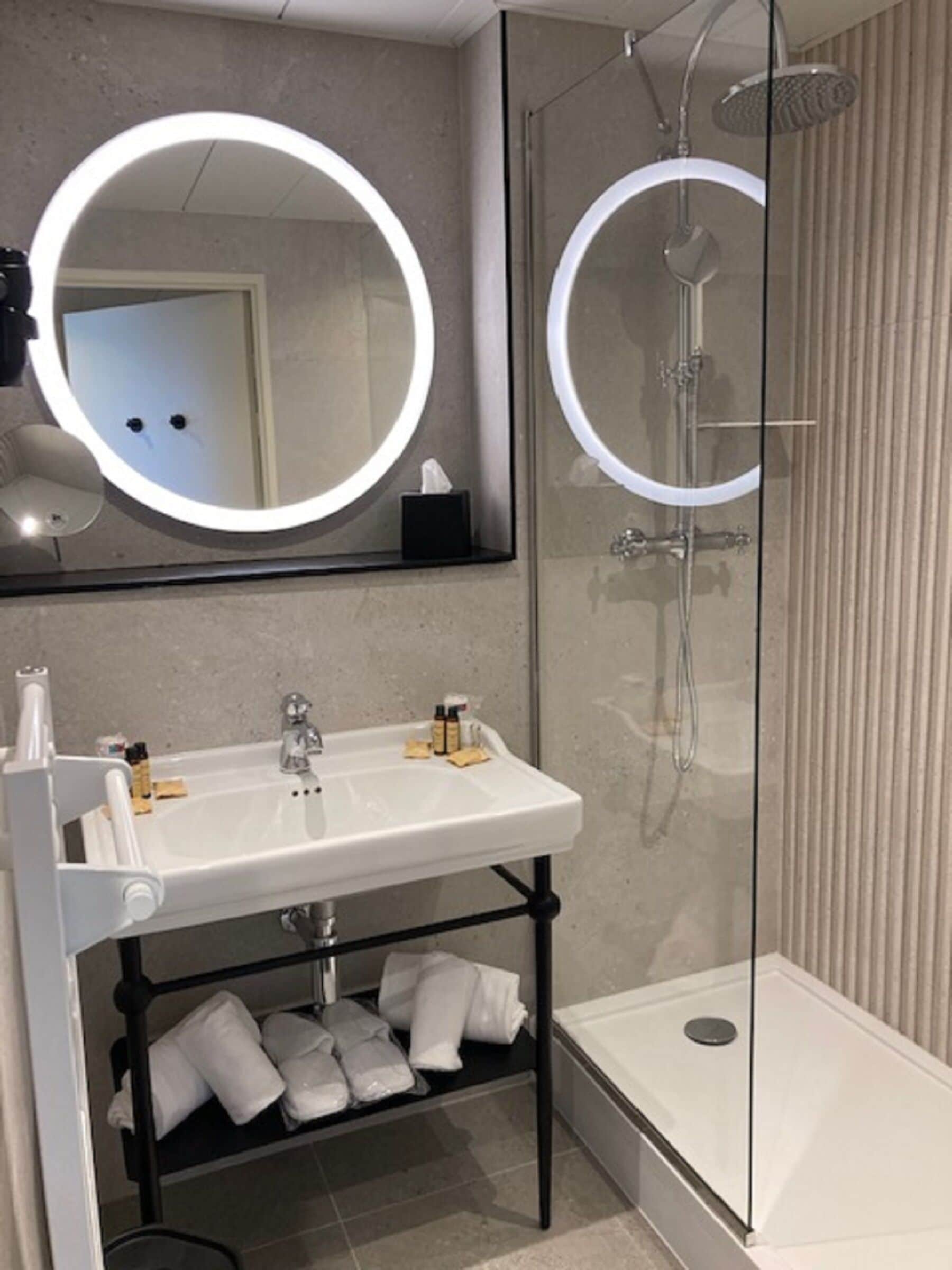 bathtub, hair dryer, towels