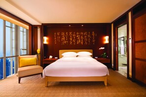 Premium bedding, down comforters, minibar, in-room safe