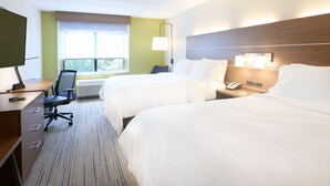 A hotel room with two beds, a desk with a computer, a chair, a lamp, and a window with a view. - Holiday Inn Express Richmond Airport by IHG (Sandston)