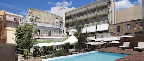 Outdoor pool, pool umbrellas, pool loungers