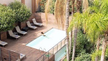 Outdoor pool, pool umbrellas, pool loungers