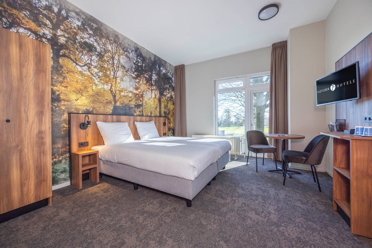 Comfort Double Room, Terrace, Garden View | In-room safe, iron/ironing board, cribs/infant beds, rollaway beds