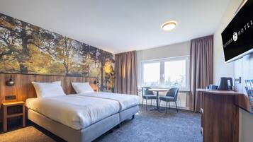 Comfort Double Room, Garden View | In-room safe, iron/ironing board, cribs/infant beds, rollaway beds