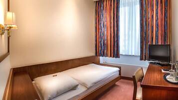 Standard Single Room | 1 bedroom, minibar, in-room safe, desk