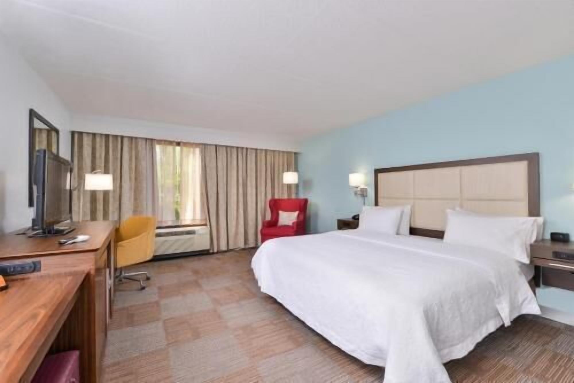 Premium bedding, desk, blackout curtains, soundproofing