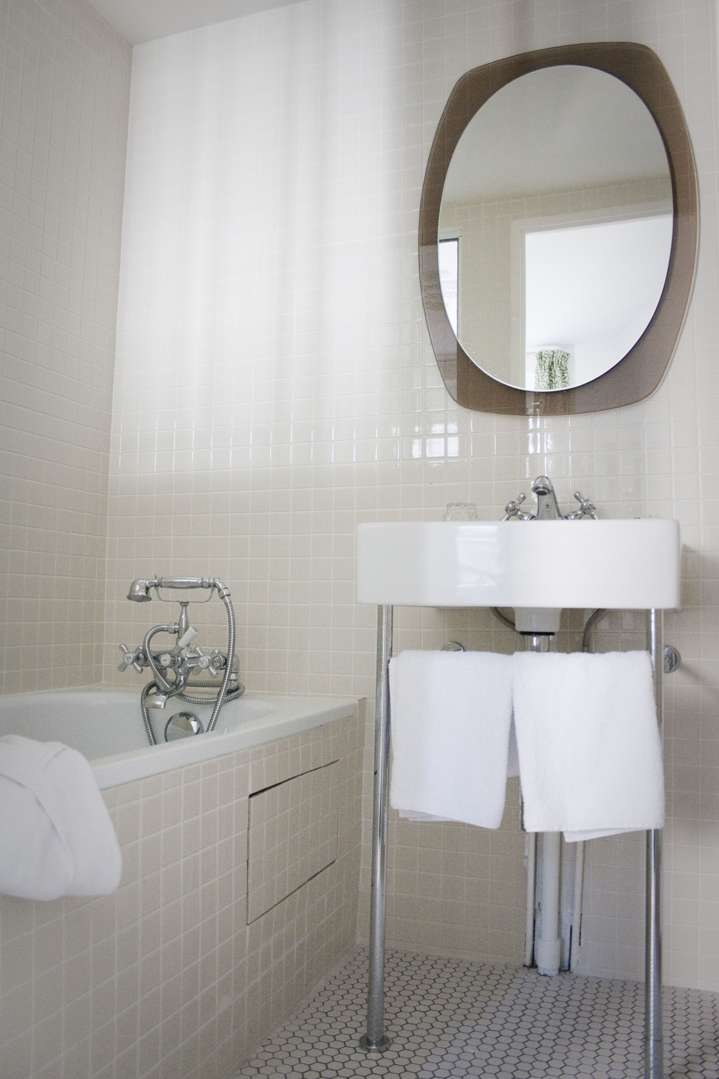 bathtub, free toiletries, hair dryer, towels