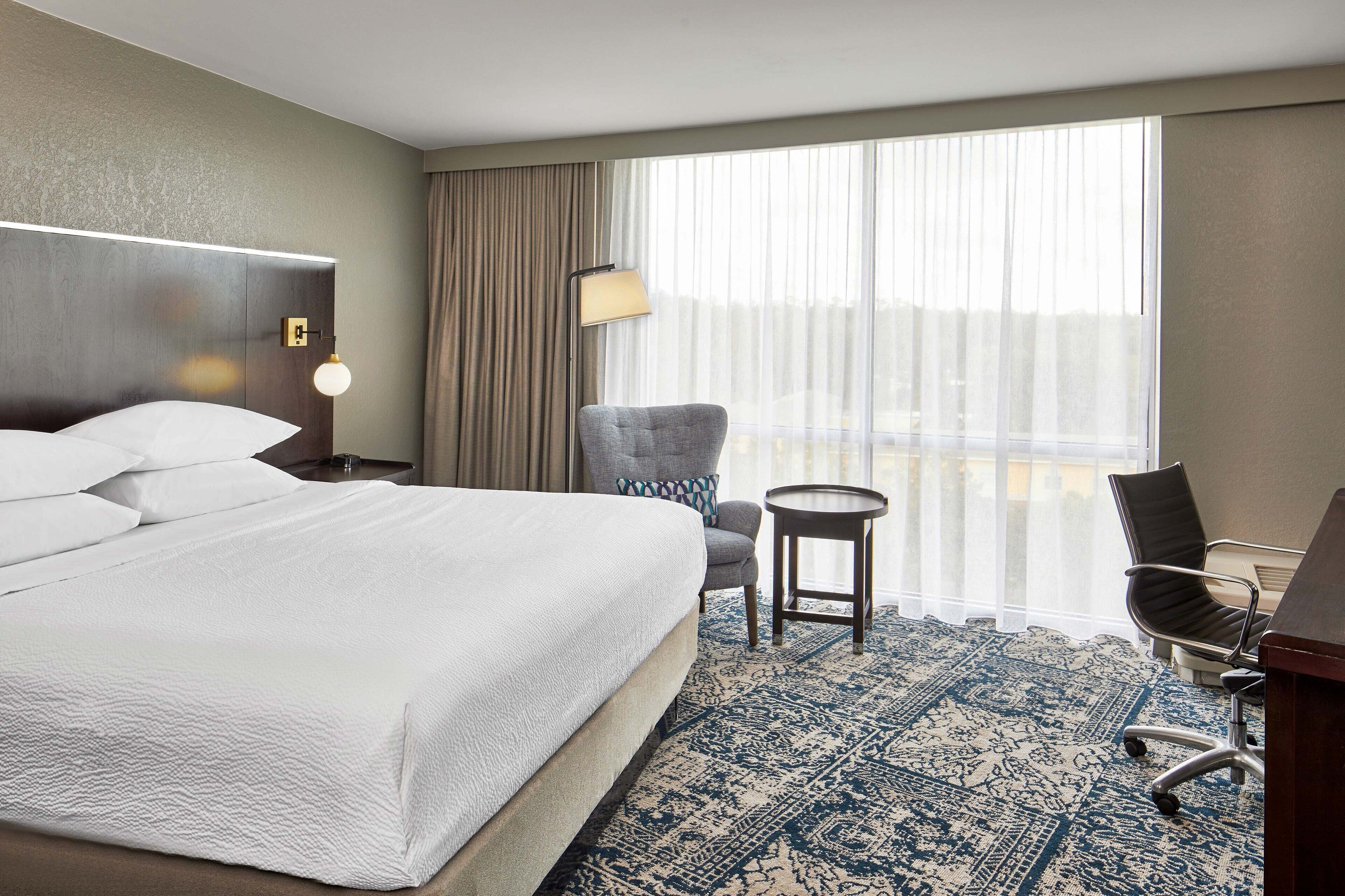 junior suite, 1 king bed with sofa bed | pillow-top beds, in-room safe, desk, laptop workspace