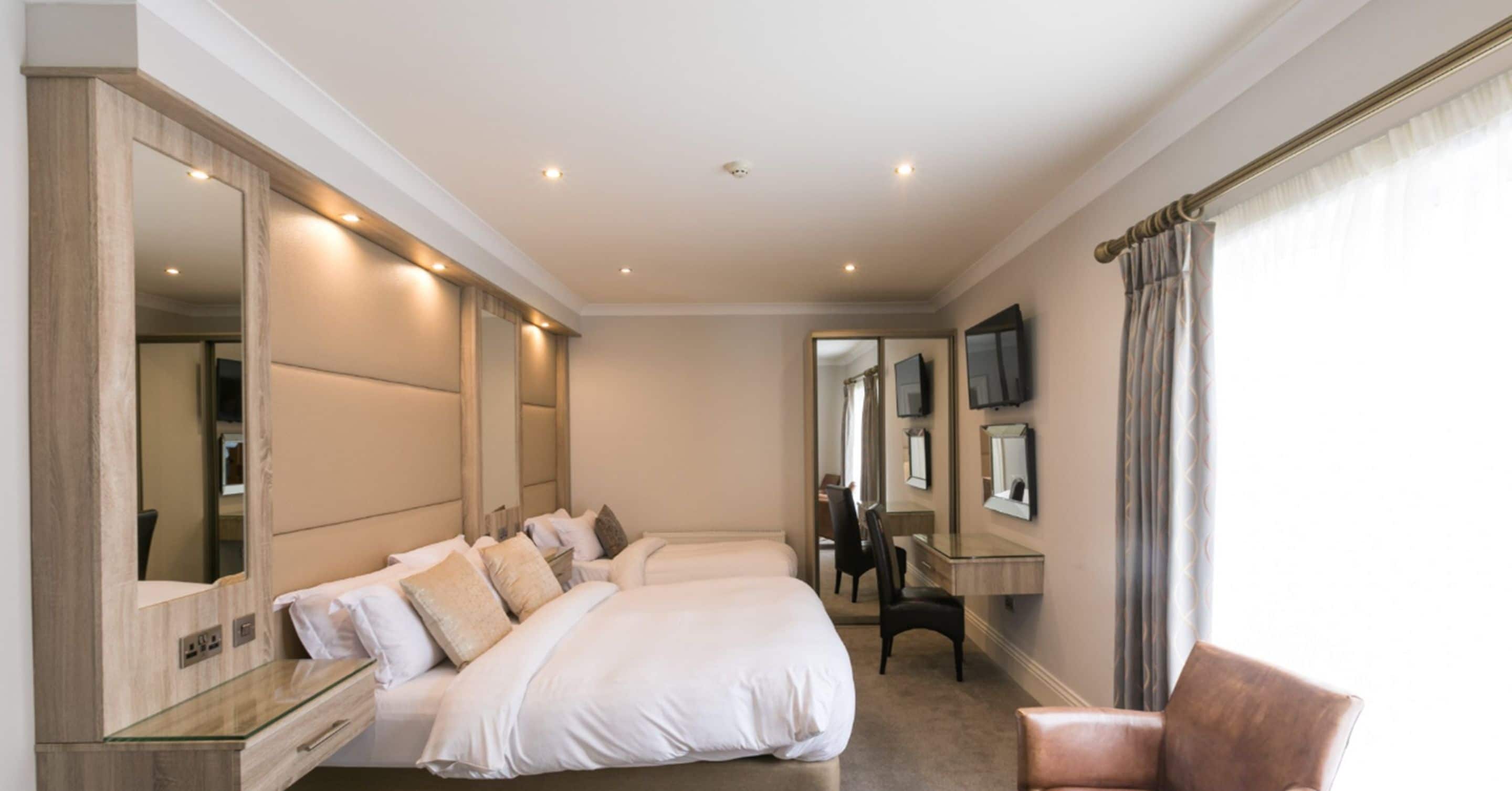 premium bedding, pillow-top beds, desk, iron/ironing board