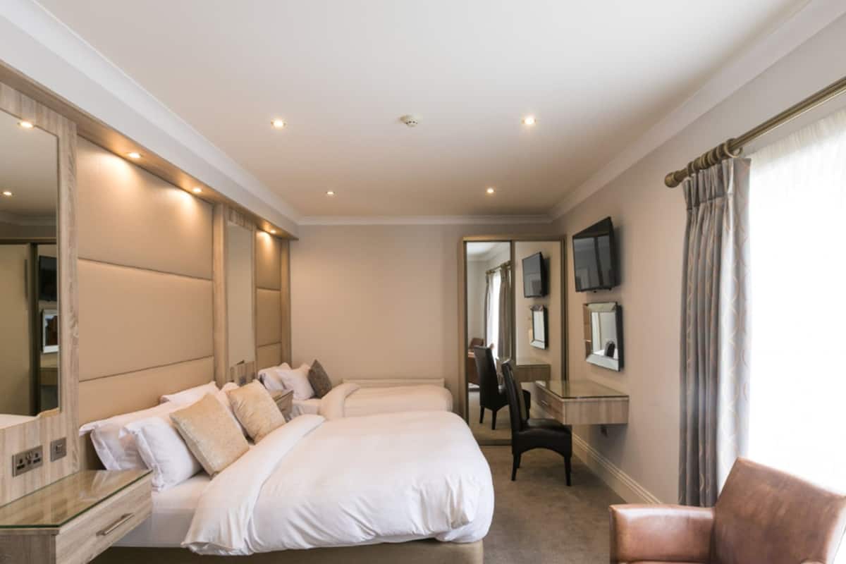 premium bedding, pillow-top beds, desk, iron/ironing board