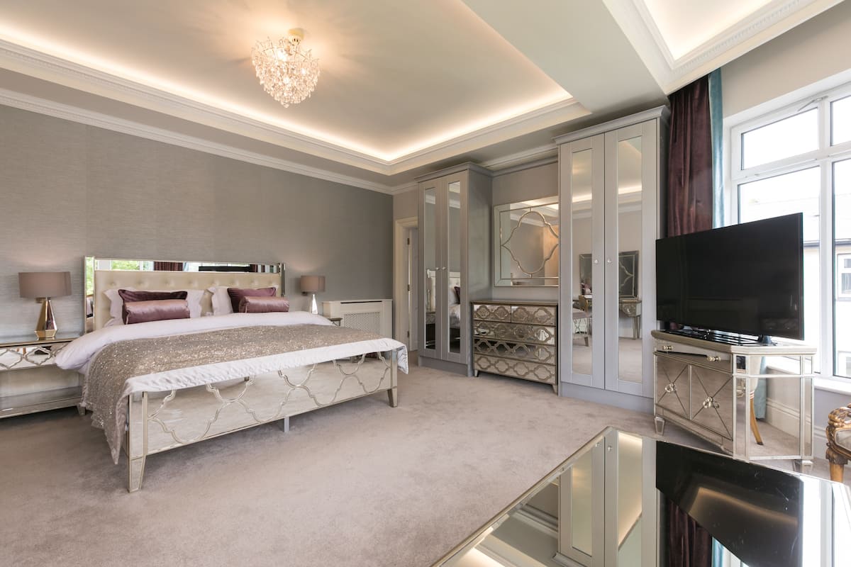 premium bedding, pillow-top beds, desk, iron/ironing board