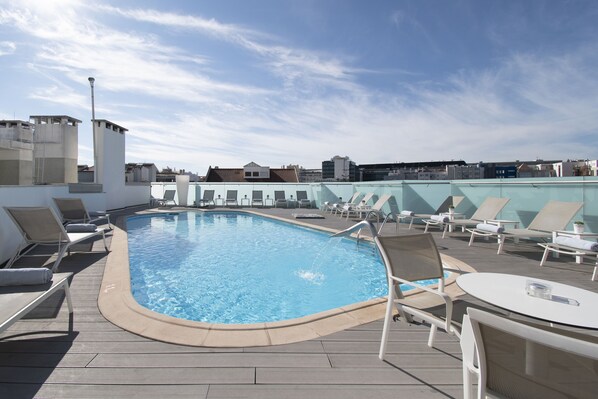 Outdoor pool, pool umbrellas, pool loungers