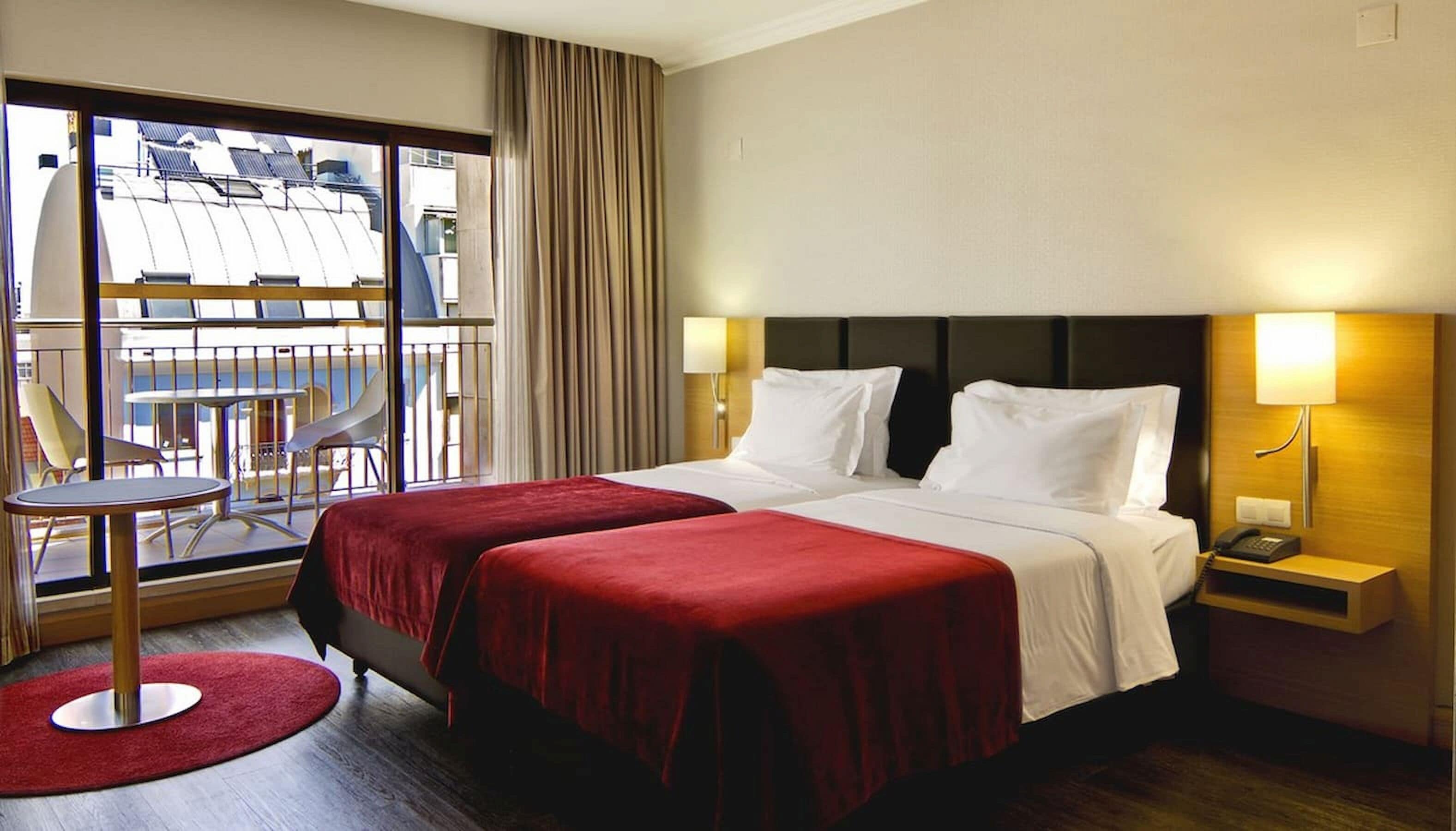 double or twin room, balcony | minibar, in-room safe, desk, blackout curtains