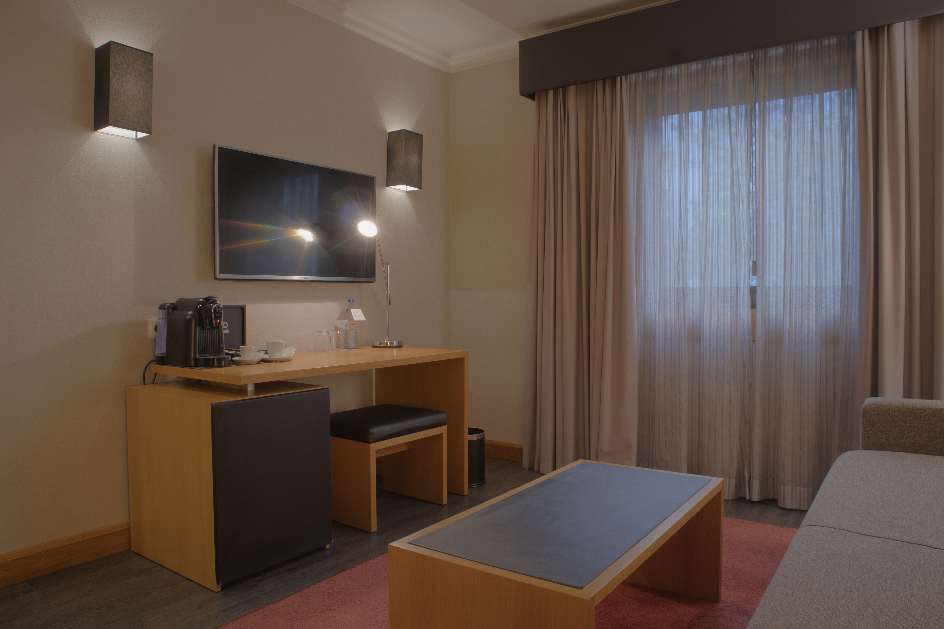 suite | living area | 28-inch lcd tv with cable channels, tv