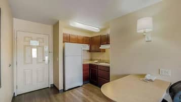 Suite, 2 Double Beds, Non Smoking | Private kitchen | Full-size fridge, microwave, stovetop, cookware/dishes/utensils
