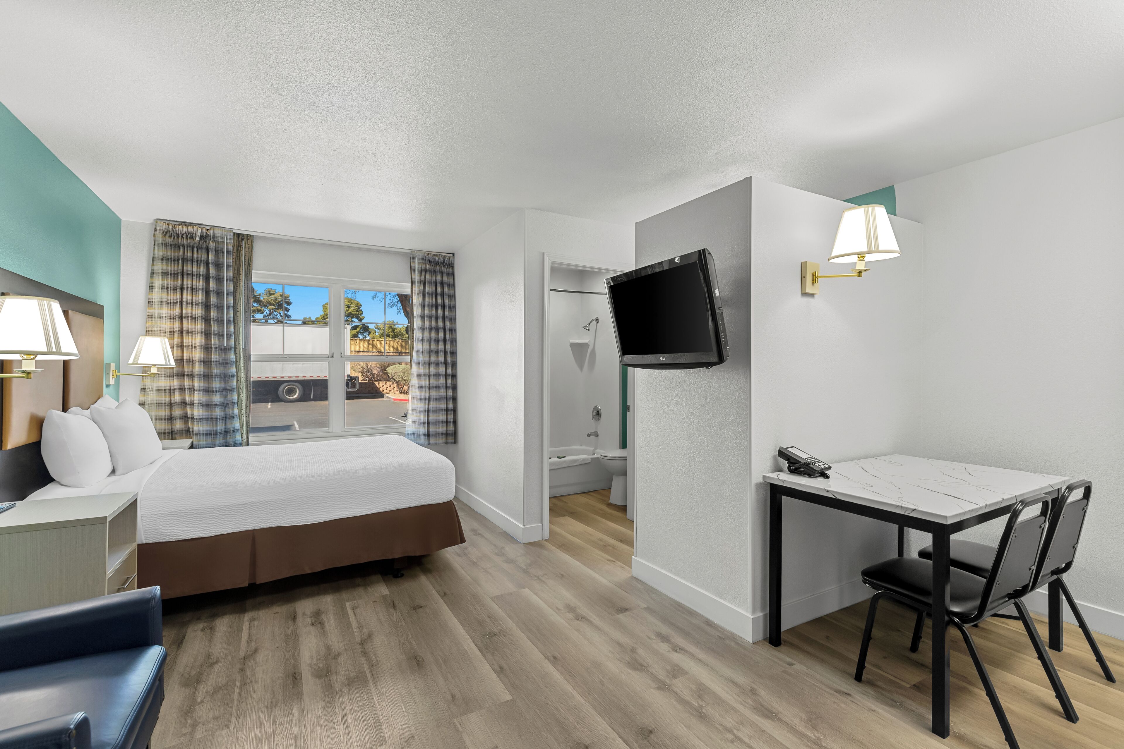 Suite, 1 Queen Bed, Non Smoking | Desk, iron/ironing board, rollaway beds, free WiFi