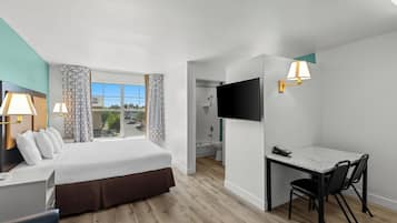 Suite, 1 très grand lit, non-fumeurs | Bureau, fer et planche à repasser, lits pliants/supplémentaires