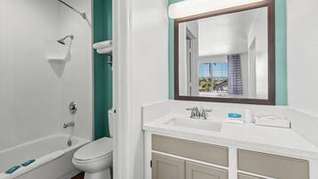 Suite, 2 Double Beds, Non Smoking | Bathroom | Combined shower/tub, hair dryer, towels, soap