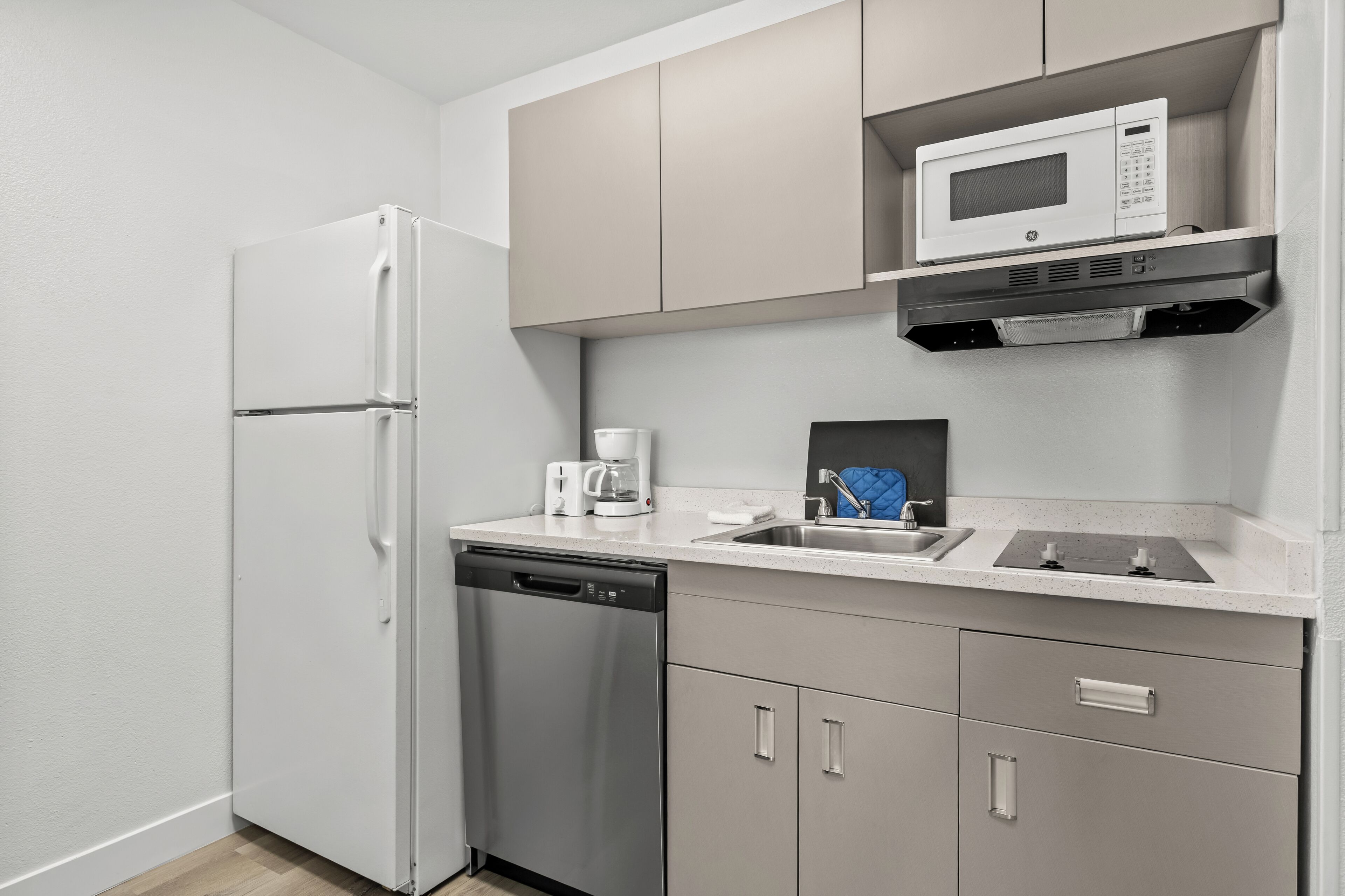 Suite, 1 Queen Bed, Non Smoking | Private kitchen | Full-sized fridge, microwave, stovetop, cookware/dishes/utensils