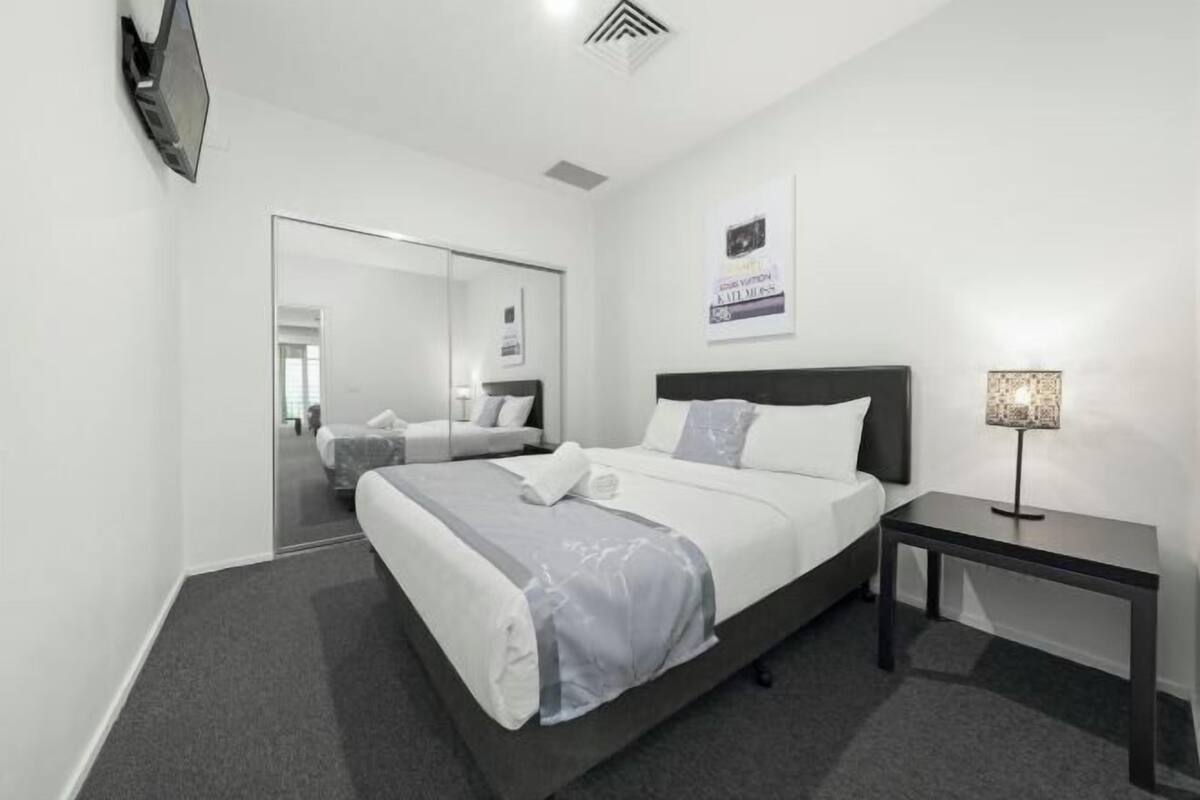 Premium bedding, blackout drapes, soundproofing, iron/ironing board
