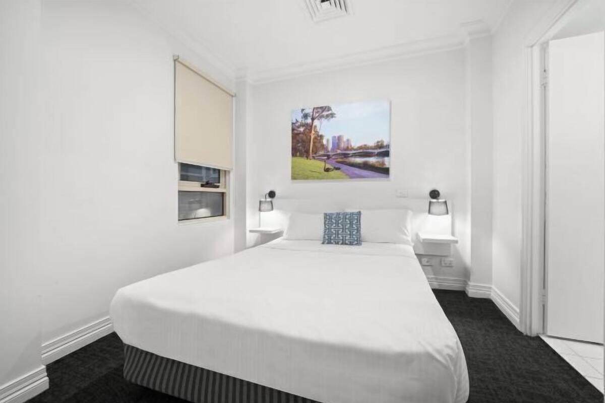 Premium bedding, blackout drapes, soundproofing, iron/ironing board