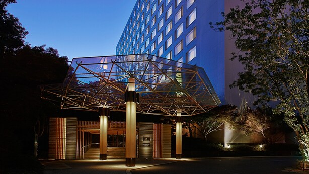 A modern hotel entrance with a glass atrium and a large, illuminated structure. - The Prince Sakura Tower Tokyo, Autograph Collection (Tokyo)
