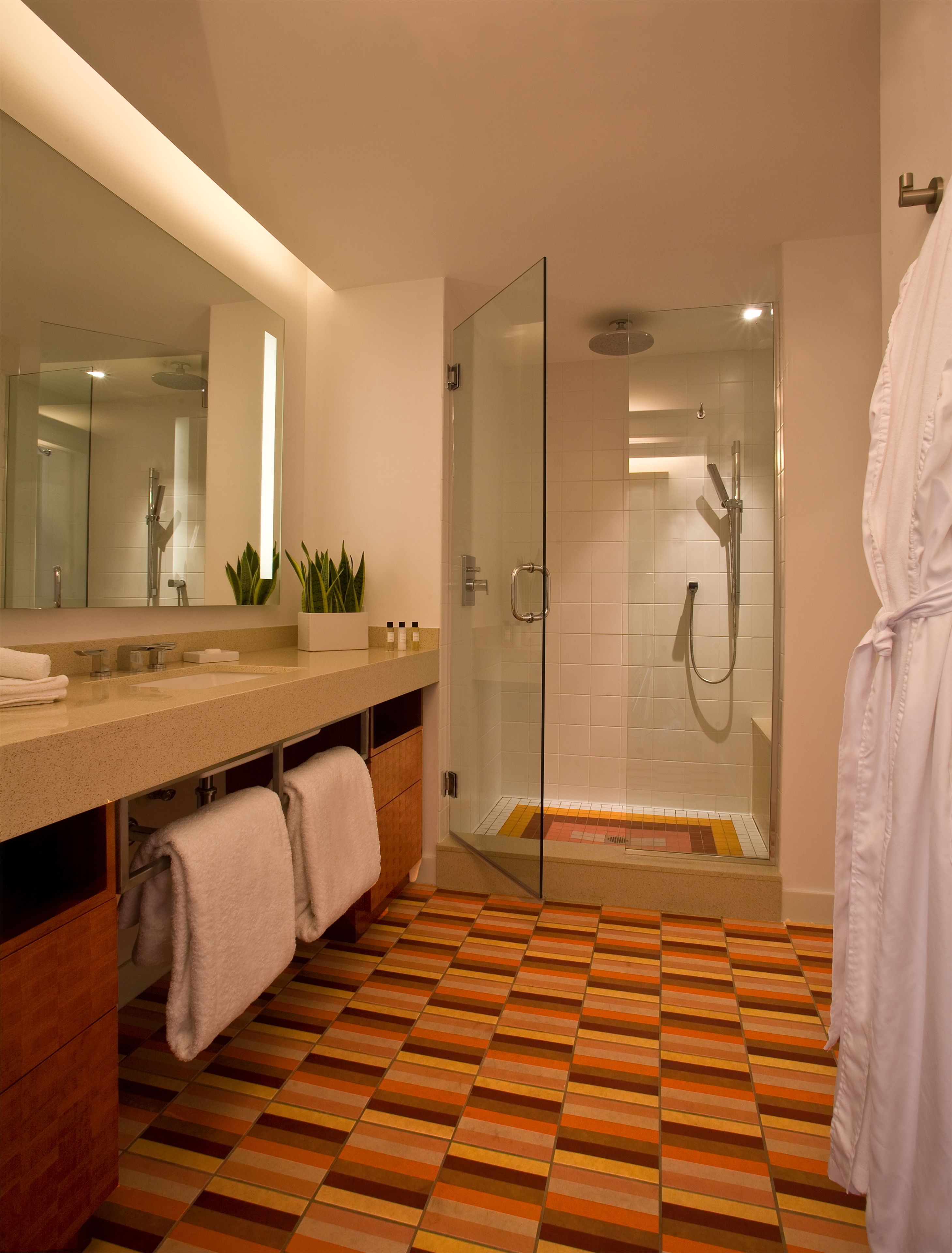 combined shower/bathtub, rainfall showerhead, designer toiletries