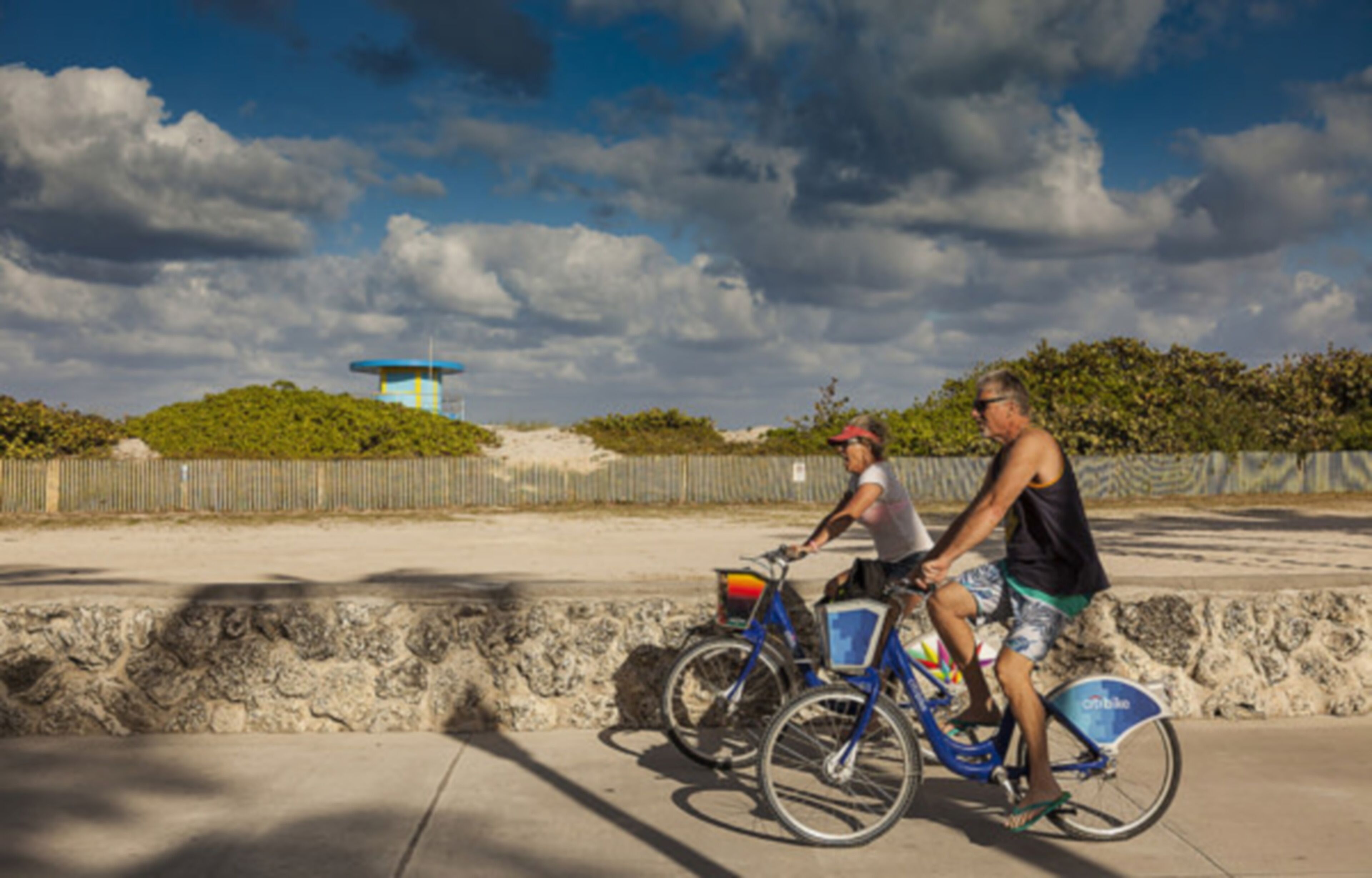 on the beach, white sand, sun-loungers, beach towels