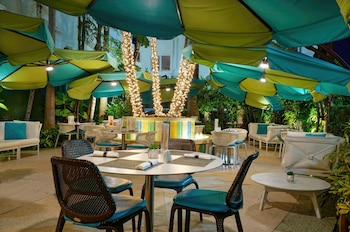 Breakfast, lunch, dinner served; American cuisine, garden views  at The Tony Hotel South Beach