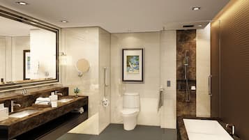 Un bagno moderno con un grande specchio, due lavabi, un water, una doccia e una vasca da bagno.