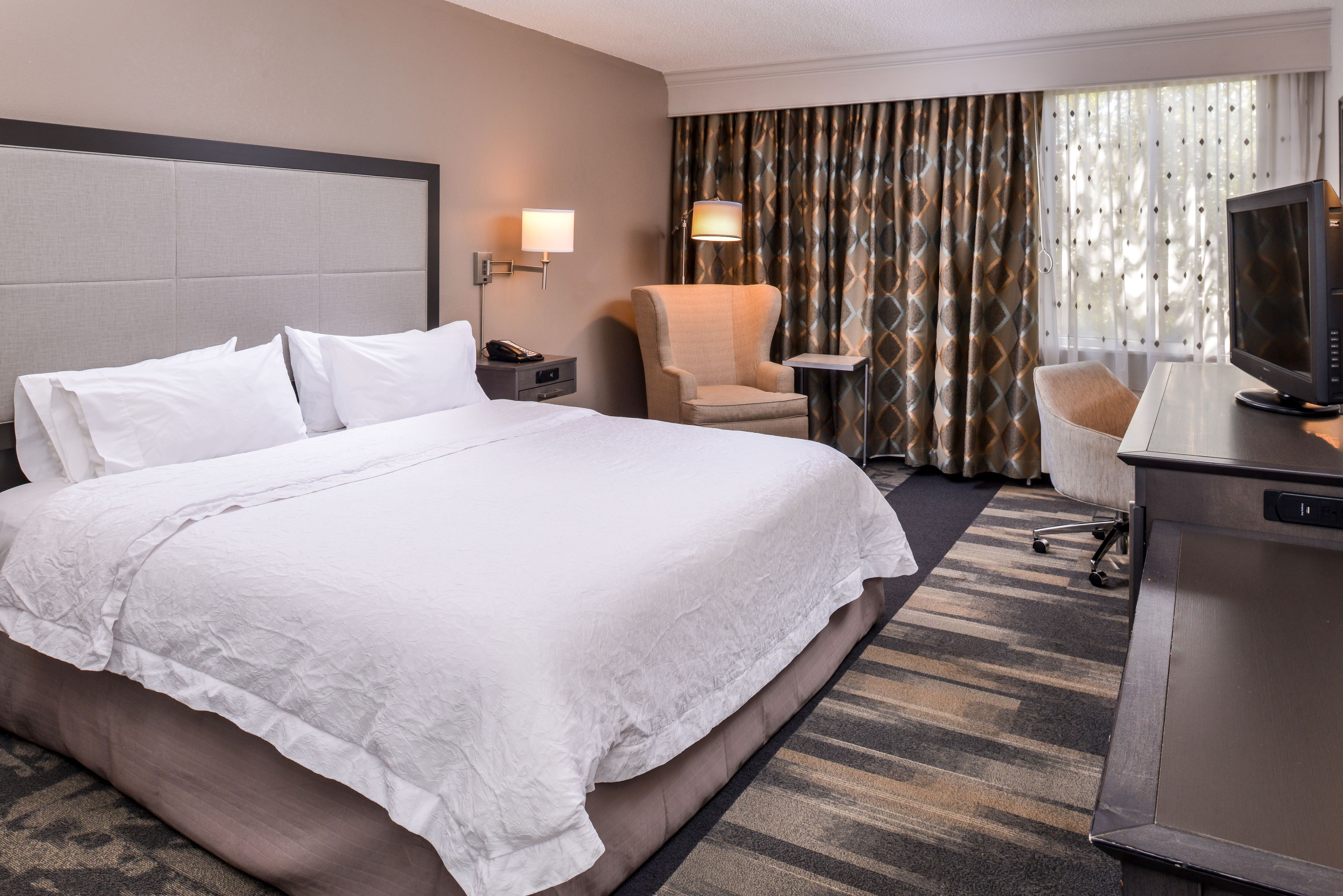 premium bedding, in-room safe, blackout curtains, iron/ironing board