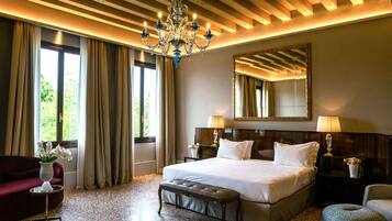 1 bedroom, hypo-allergenic bedding, down comforters, minibar