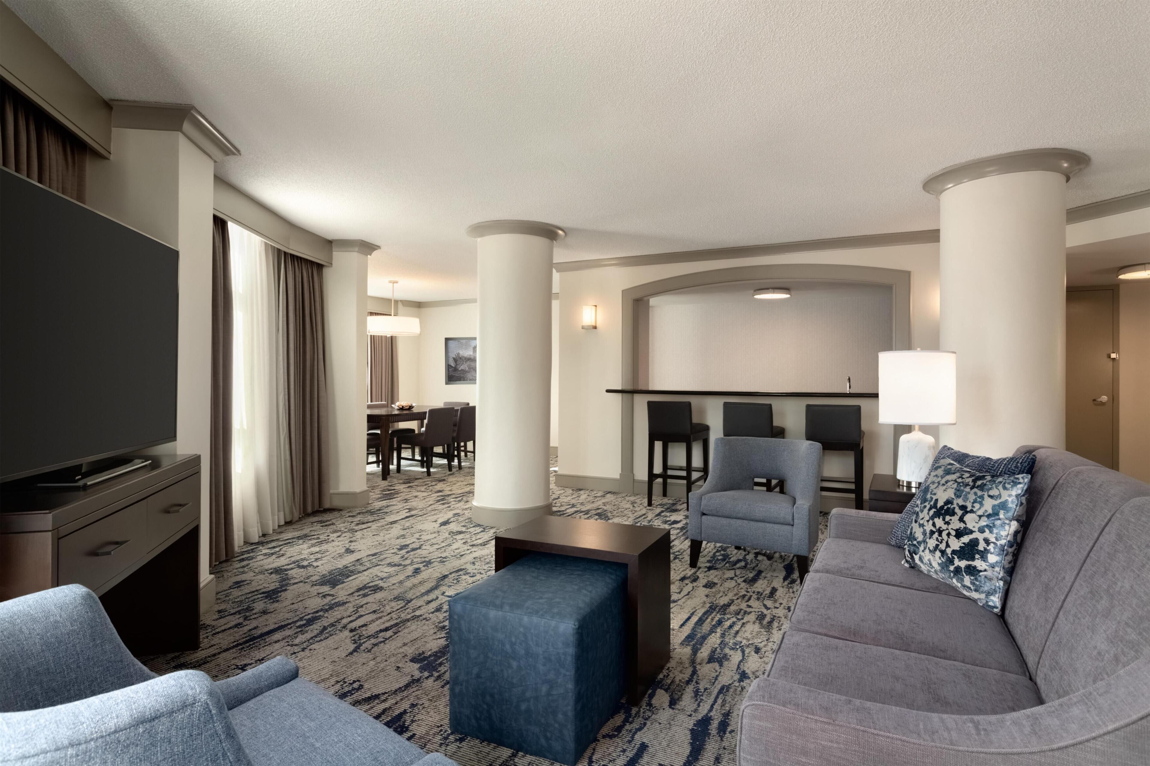 Presidential Suite, 1 King Bed | Living area | 49-inch flat-screen TV with satellite channels, TV, pay films